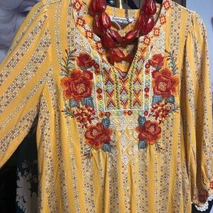 Yellow Embroidered Dress with Red Floral Design